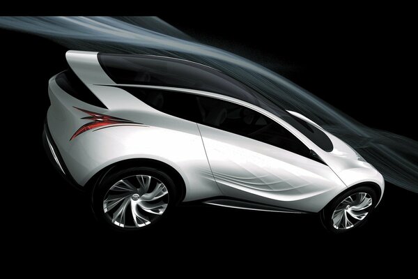 The car is a Mazda or kazamai concept car