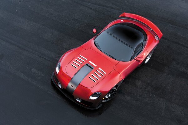 Red supercar with black roof