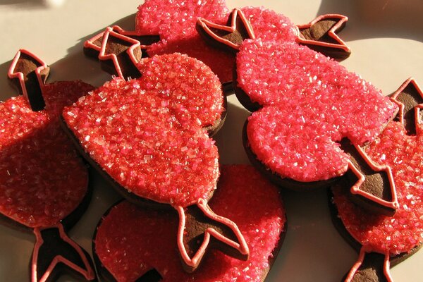 Red cookies hearts with arrows