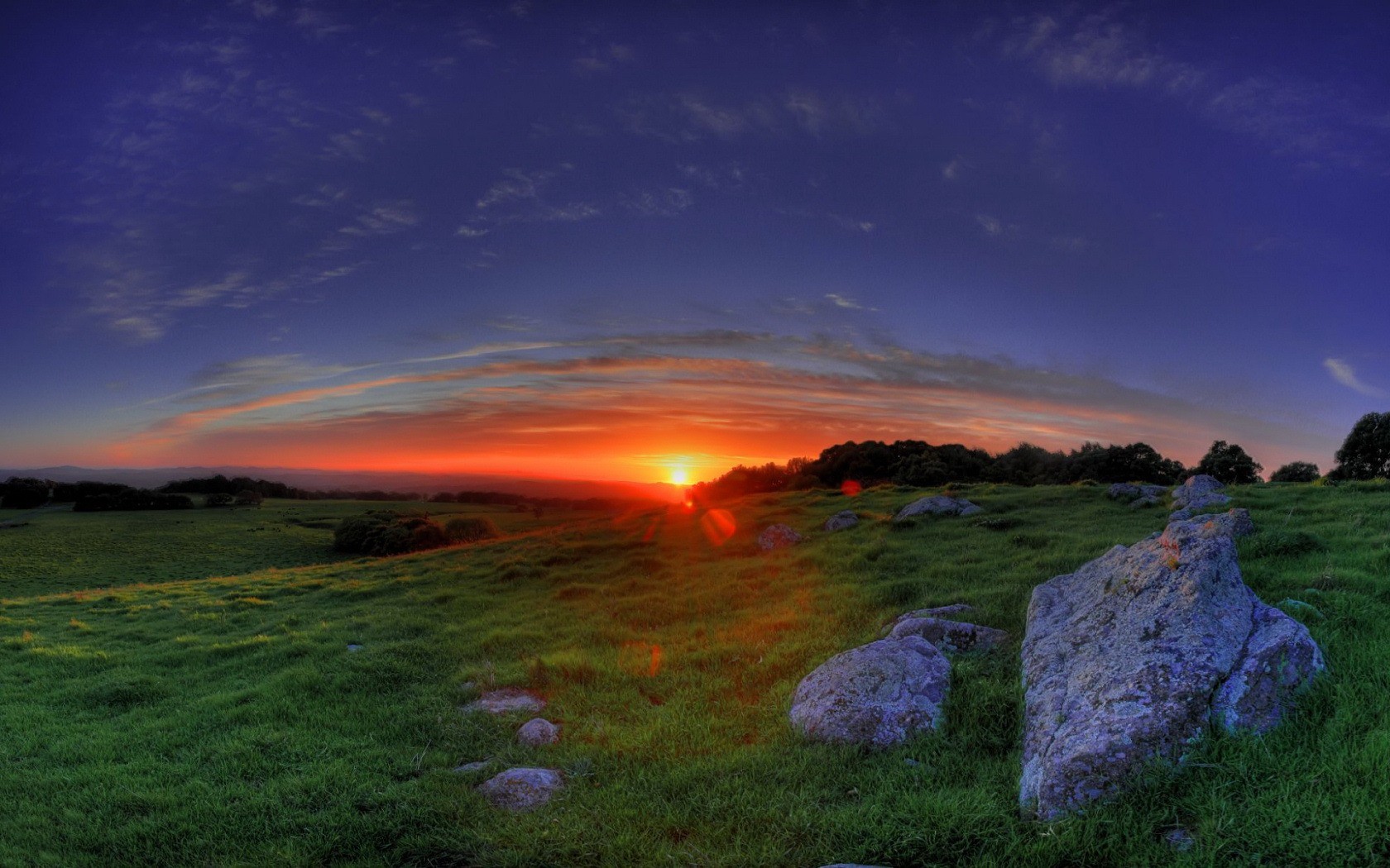 coucher de soleil pierres herbe