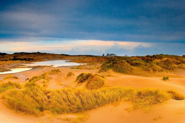 Sandy landscape with clouds