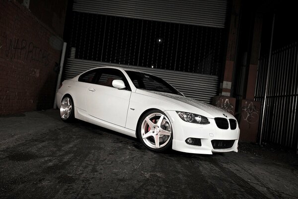 White BMW car with alloy wheels