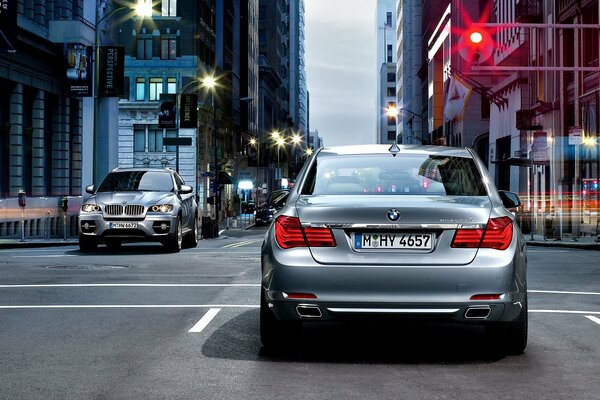 A cool BMW car is driving around the city