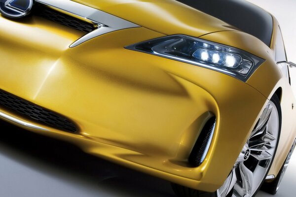 Yellow Dexus headlight close-up