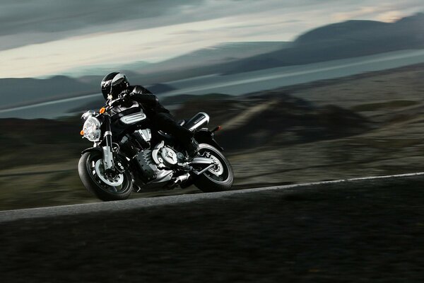 Rider on a motorcycle in motion on the highway