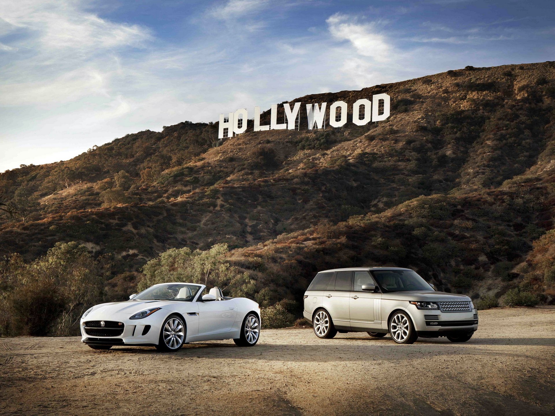 jaguar f-type blanc et land rover range rover