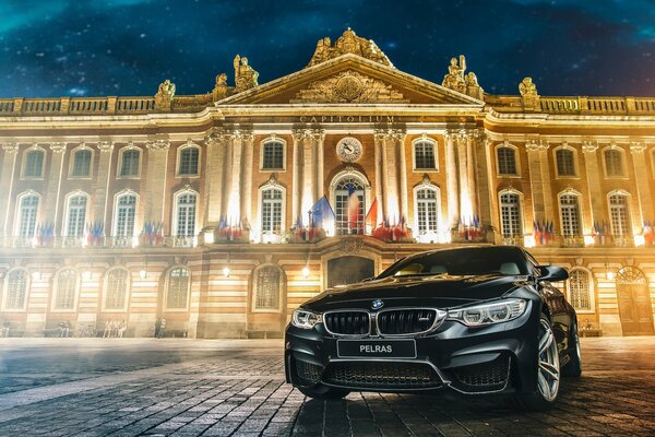 Black bmv m4 on the background of the palace