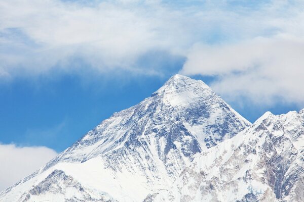 Snowy peak of a high mountain