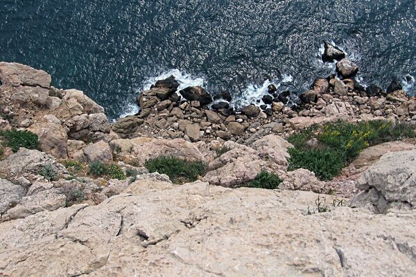 Waves hitting the answering rocks