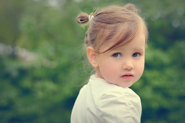 Portrait of a beautiful child in nature