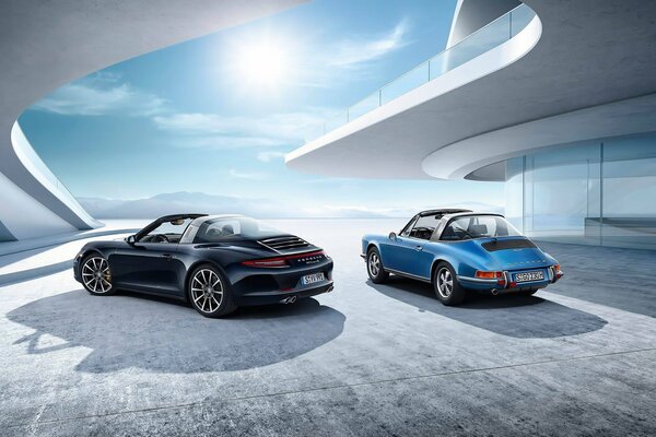 911 targa c und Porsche Fahrzeuge im Hof einer Luxusvilla