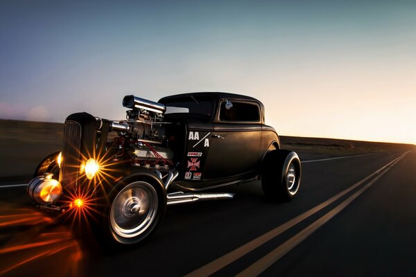 Retro Ford car on the evening road