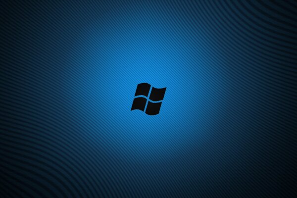 Das Windows-Logo leuchtet auf blauem Hintergrund