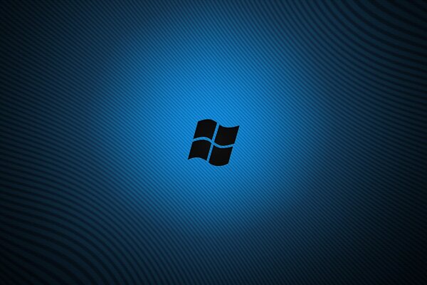 The windows logo glows on a blue background