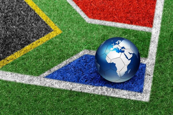 Piłka nożna w postaci planety Ziemia na tle flagi RPA