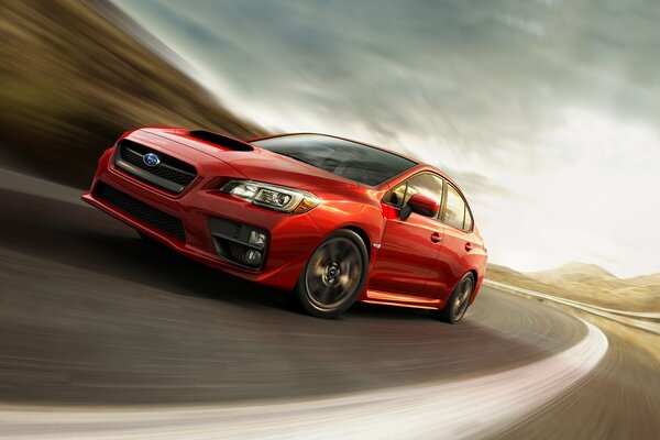 Red subaru wrx driving on the road