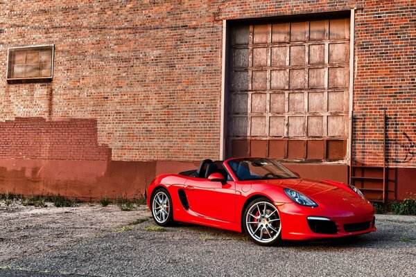 Luxury Porsche car in an abandoned building