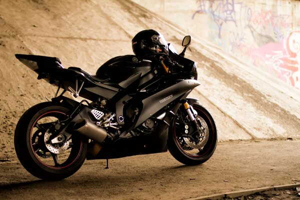 Yamaha sports bike under the bridge