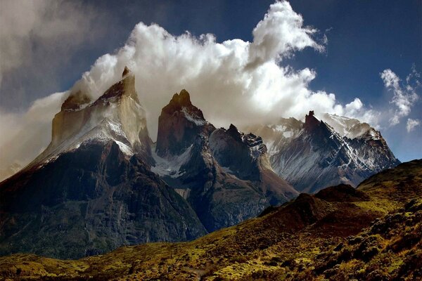 Snow and clouds combine in the mountains