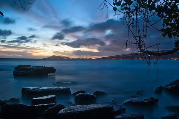 Evening shore with rocks