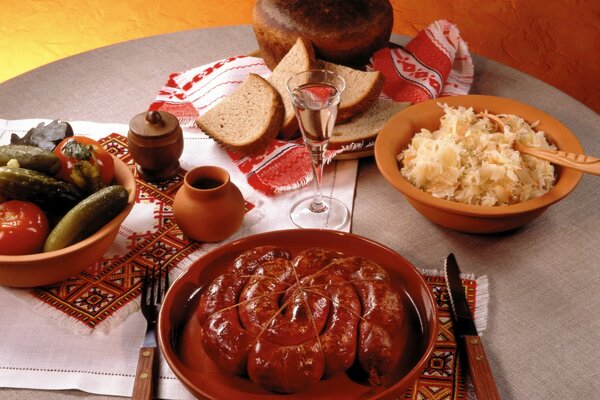 Dinner of meat pickles and bread