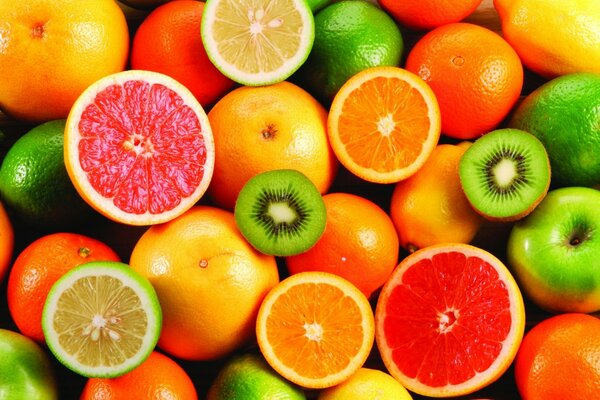 Delicious juicy fruits lying on the table