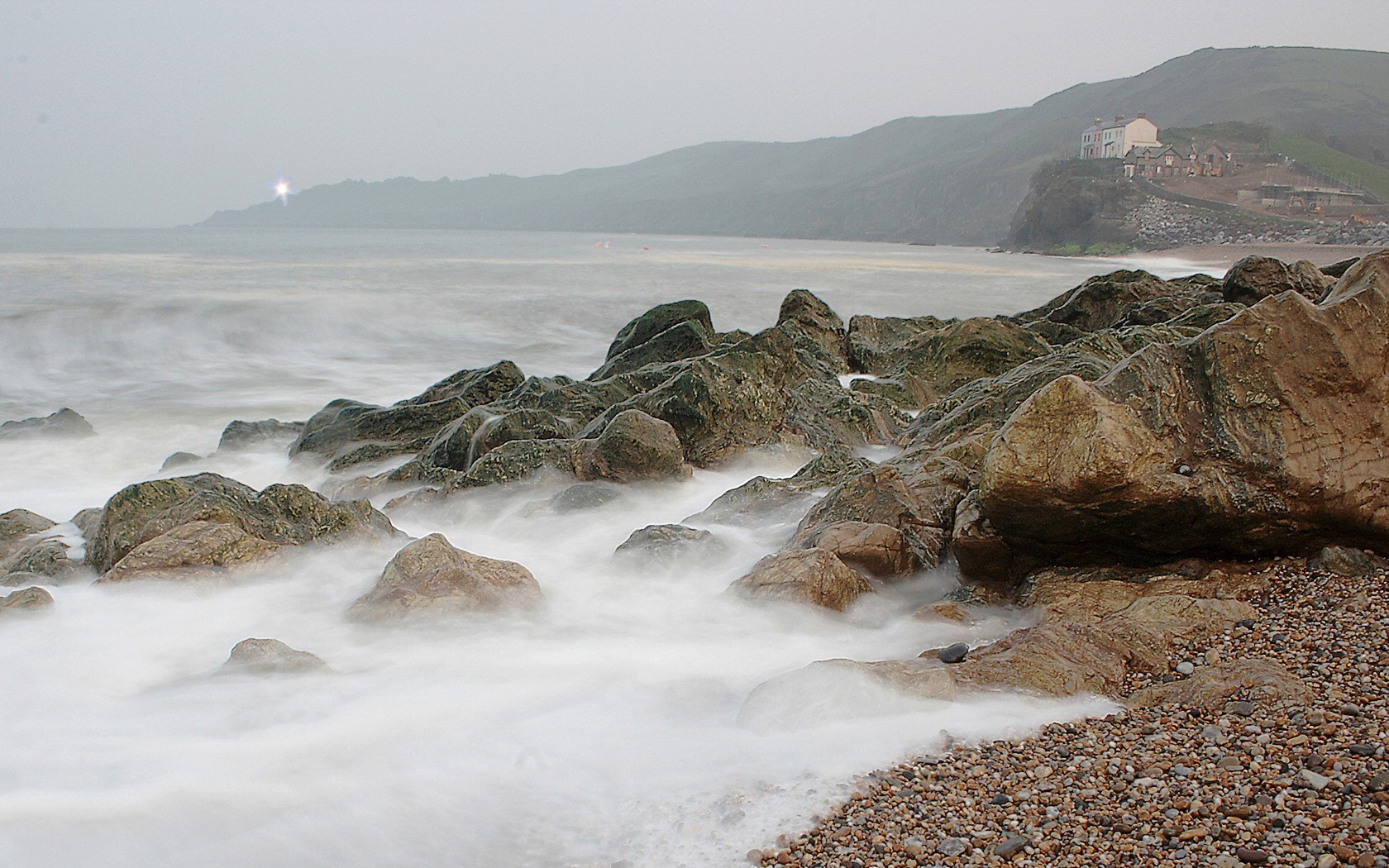 tones beach water mountain wave