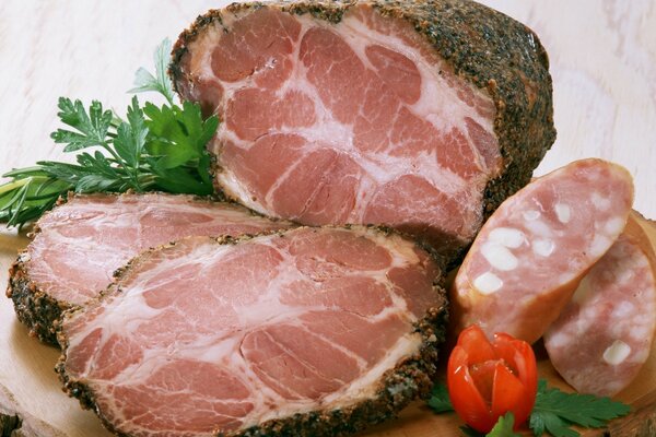 Sliced pieces of pork on a cutting board