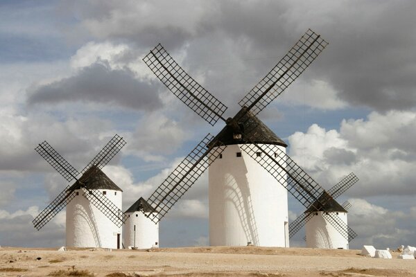 Mills in the field under the clouds