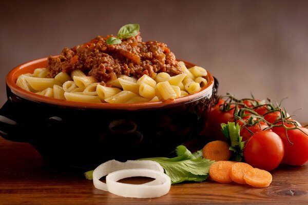 Pasta in navy style in a clay plate