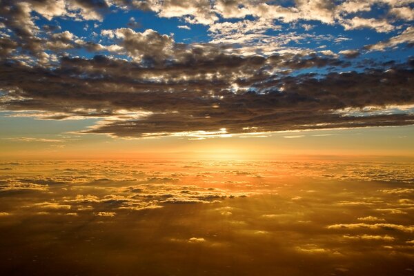 Bright light from sunset and clouds from above