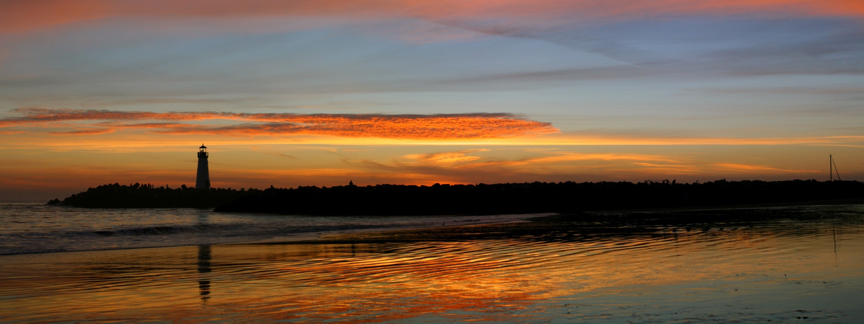 phare coucher de soleil surf