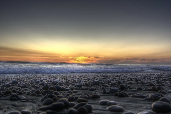 Photo of the sea shore with pebbles