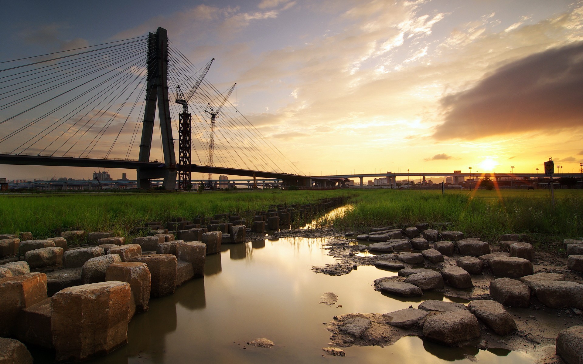 мост стройка закат камни вода
