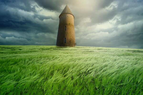 Tower field clouds grass