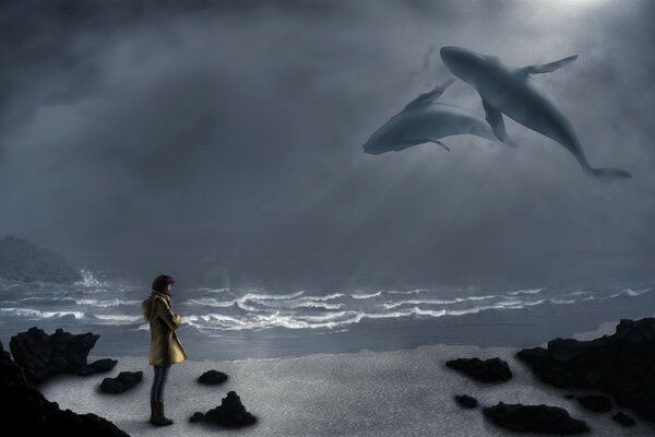 An image with whales in the sky. A lonely man on the shore