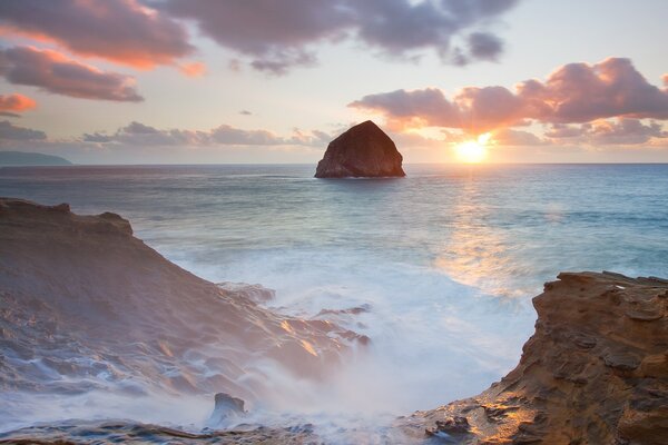 Shore waves sun rocks