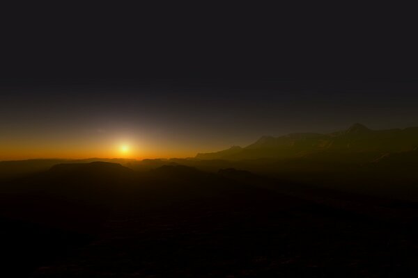 Die Sonne geht über den Horizont hinaus. Dunkle Wüste