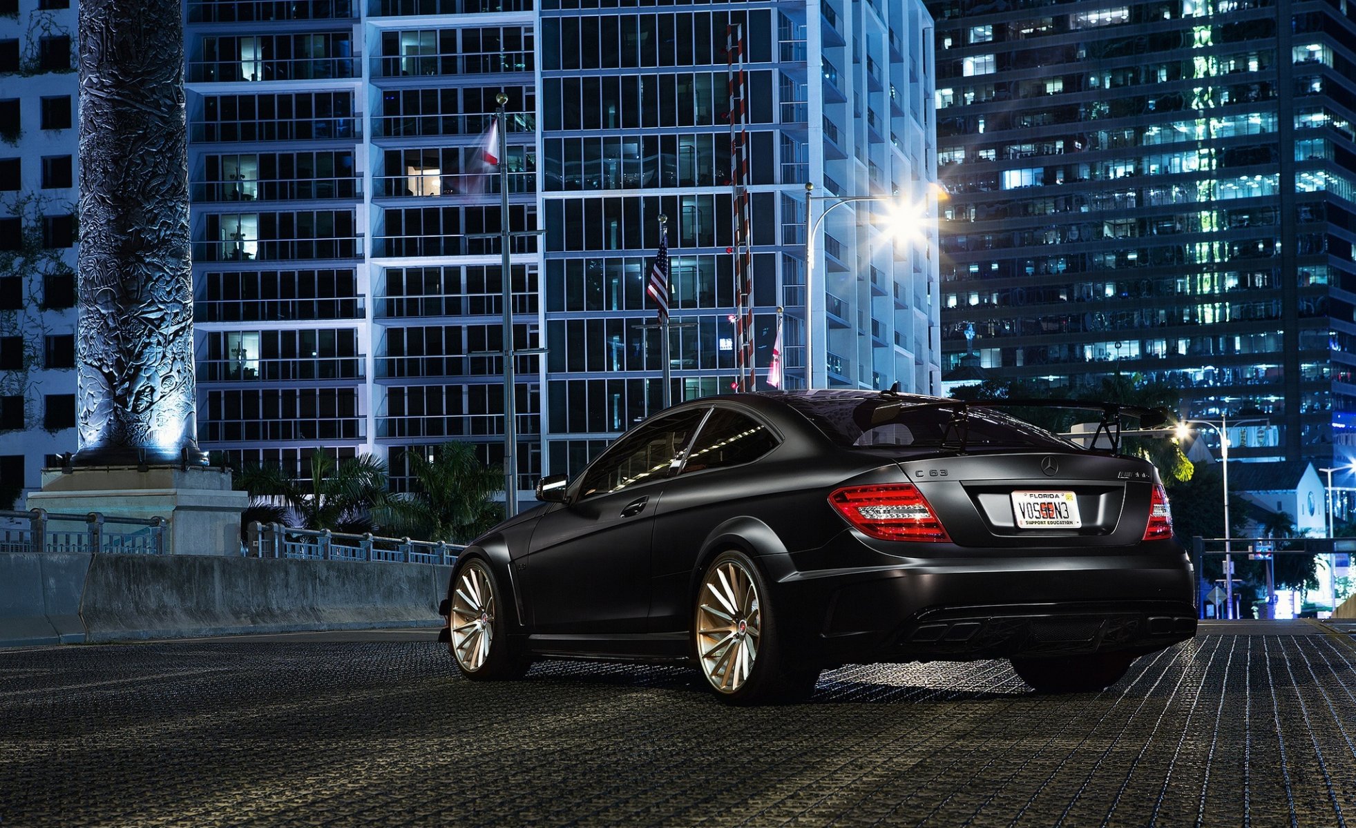 mercedes-benz c-klasse c63 amg black rear town building