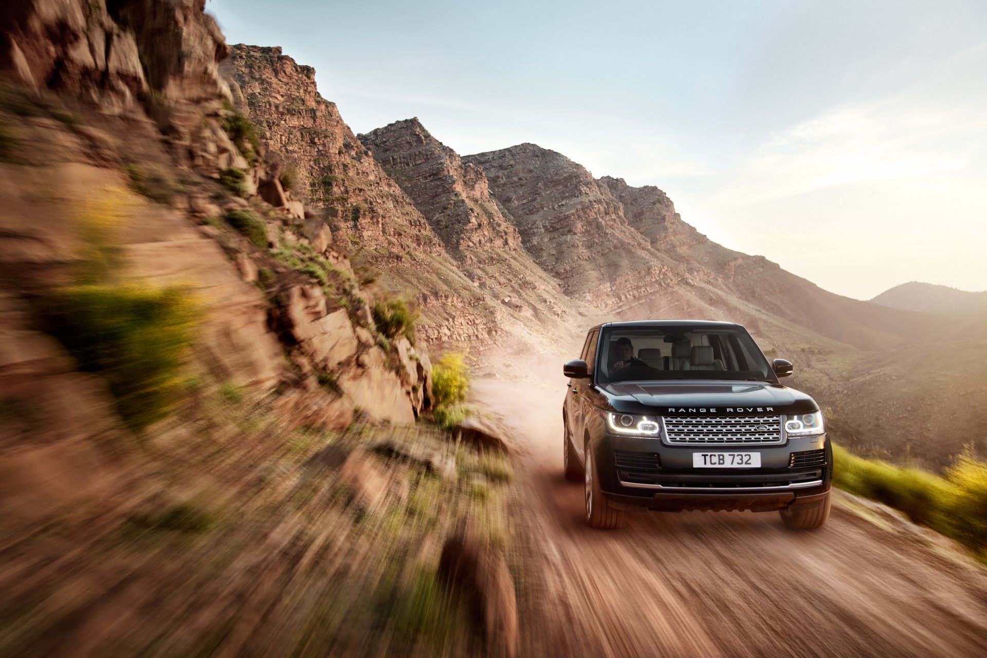 land rover range rover machine suv in motion sky land