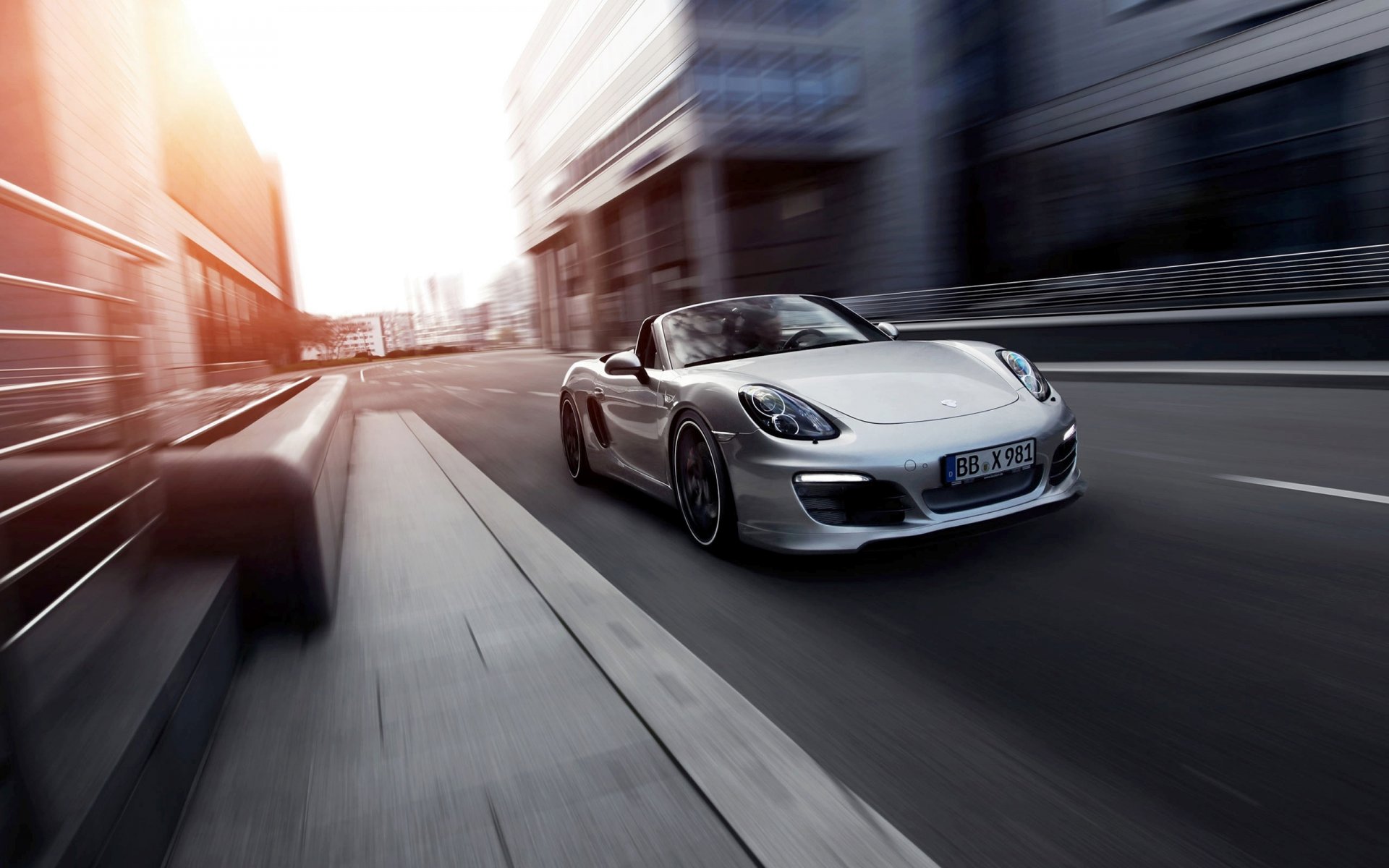 porsche boxter auto cabriolet ville avant gris