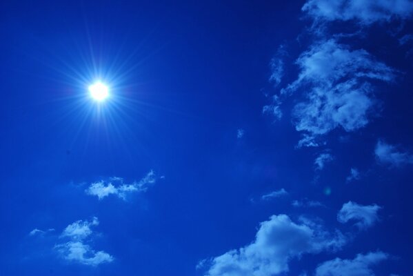 On the blue and blue background of the sky, the sun also seems blue