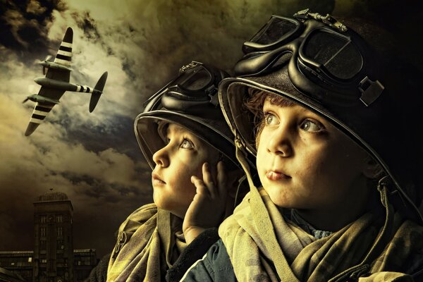 Boys in helmets. A plane in the sky