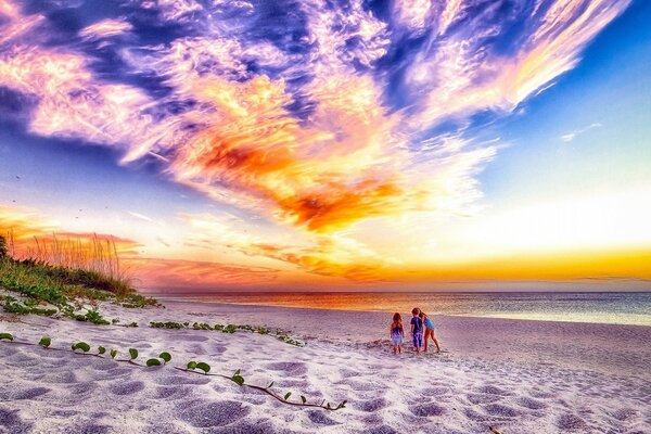 Children play on the beach