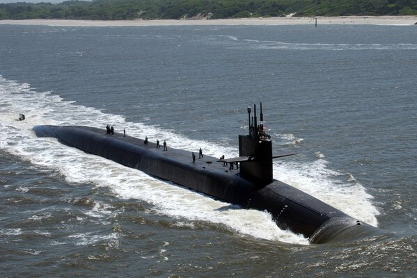 A submarine sticking out of the water