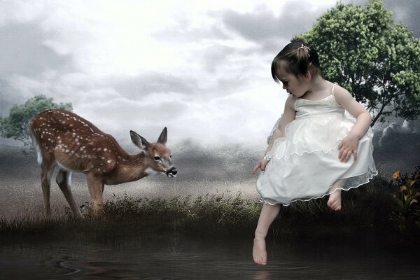 Bambina in abito bianco e cervo