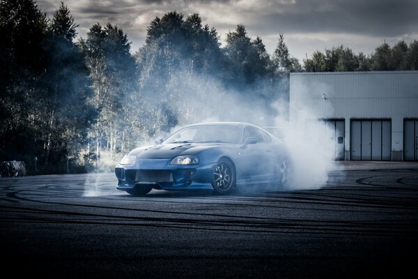 Blue Toyota Supra on drift