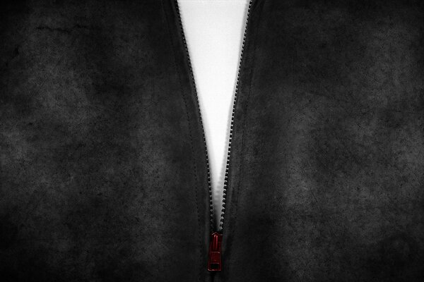 Unbuttoned red zipper white on black