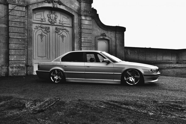 BMW e38 750il tuning landing on the background of the gate b/w