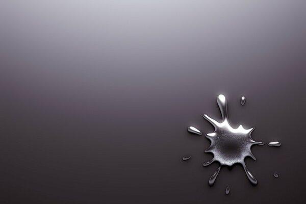 Silver mercury spray on a gray background